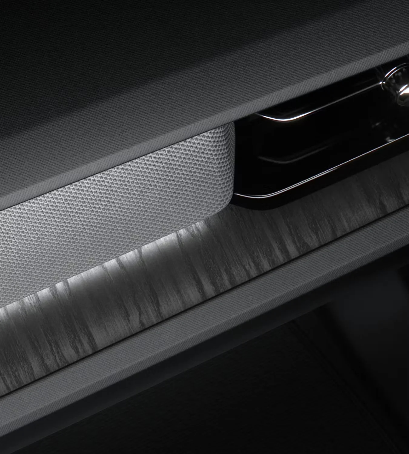 Contre-porte de la Polestar 2 : textile, bois et éclairage d'ambiance